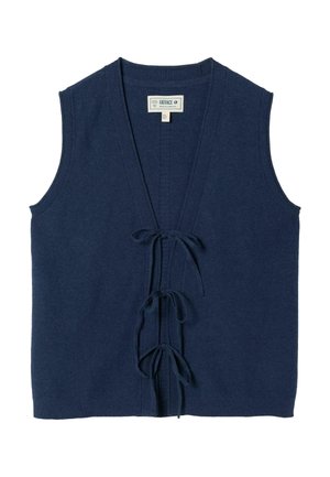 Tmavě modrá pletená vestavě bez rukávů s výstřihem do V a třemi zavazovacími uzly na přední straně, značená FatFace, vyrobená v Kambodži.
