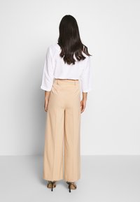 EDITED Kalhoty - beige
