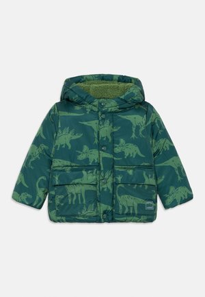 Green puffer jacket featuring a dinosaur pattern in lighter green, a hood, and two front pockets. Fleece lining adds texture.