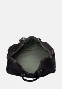 Schwarze Wildledertasche mit Lederakzenten und Reißverschluss. Geräumiges Innenleben mit grünem Stofffutter und zwei zusätzlichen Taschen.