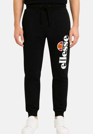 DE JOGGING IMPRIMÉ - Pantalon de survêtement - noir