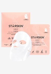 Fastegørelse bio-cellulose ansigtsmaske fra STARSKIN, med en hvid sheetmaske på en lyserød emballage med tekst og ikoner til brug og ingredienser.