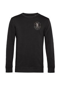 Svart långärmad sweatshirt gjord av bomull, med en ribbad rundhals och en liten grå sköldlogotyp med ett "N" på bröstet.