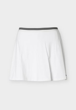 Balta A formas svārki ar melnu elastīgu jostu ar divām svītrām, attēloti izvērsti uz gaiša fona.