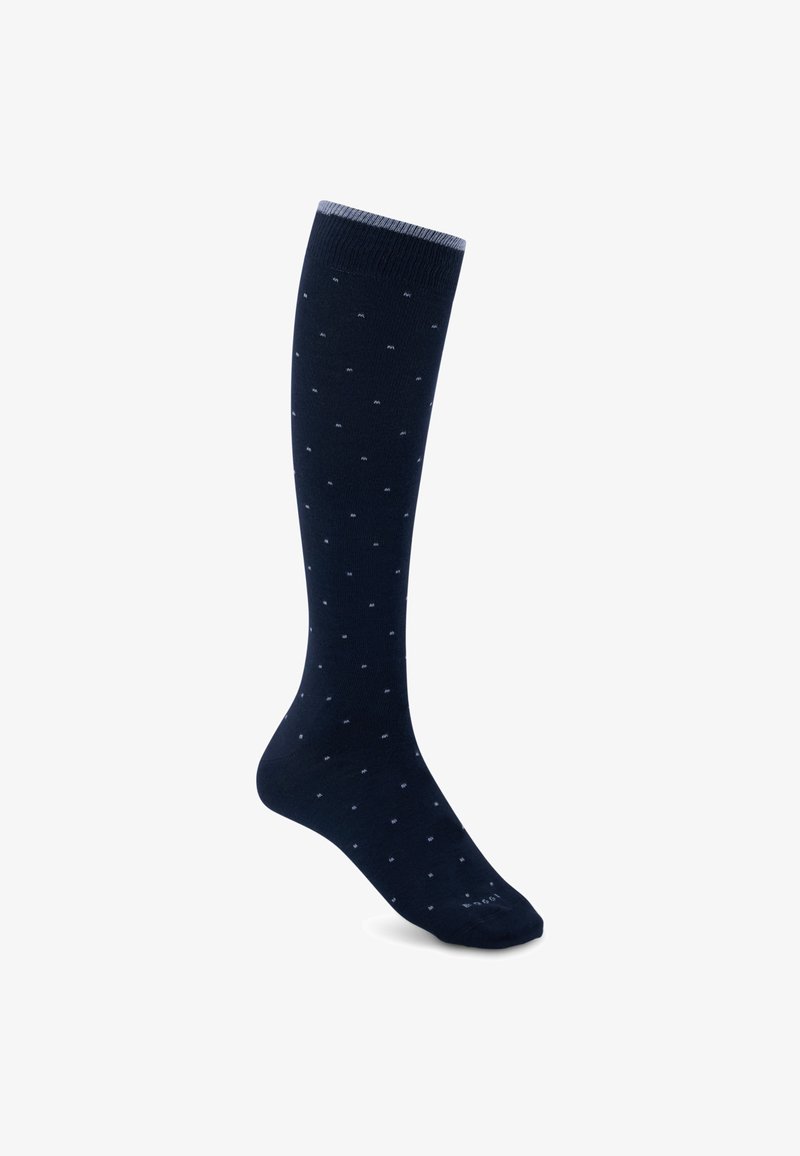 Chaussette bleu foncé montante jusqu'au genou avec de petits points bleu clair et une bande gris clair en haut, présentée sur un fond blanc.