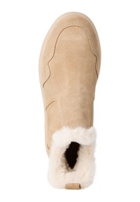 Beige Wildleder-Stiefelette mit weichem weißem Fellfutter, runder Zehenkappe und flexibler Gummisohle. Verfügt über dezente Nahtdetails.