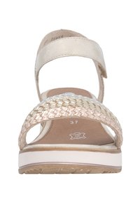 Strappy sandal featuring a metallic upper, woven detail in shades of beige and gold, a cushioned insole, and a flat outsole with a slight heel.