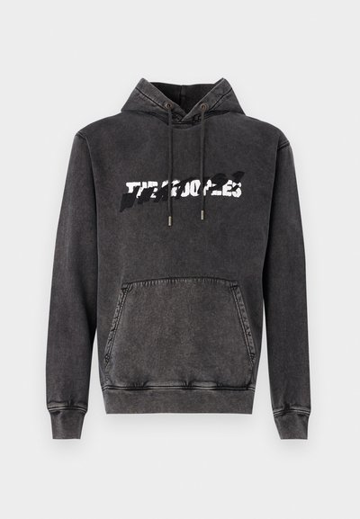 Black hoodie made of cotton blend, featuring a front pocket, adjustable drawstrings, and a graphic text design in white across the chest.