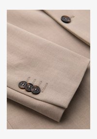 Sélectionné, beige