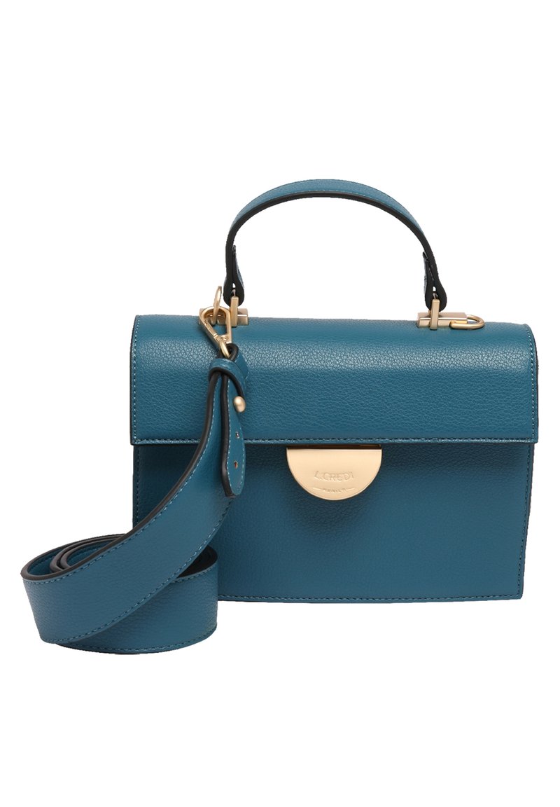 Sac à main en cuir bleu sarcelle avec une forme structurée, une poignée supérieure et une bandoulière réglable. Il est doté d'un fermoir doré et d'une texture lisse.