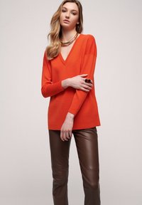 Selected, arancio