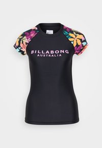 Black short-sleeve rash guard with floral patterned sleeves and "BILLABONG AUSTRALIA" printed in pink across the front. Smooth texture.