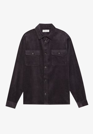 Dark gray corduroy shirt with long sleeves, two chest pockets, button closure, and ribbed texture. Features a pointed collar and cuffed wrists.