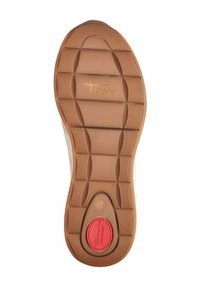 Kerge pruunist kummist kinga väline, millel on tekstuuriline haardeosa, punane "Comfort" nupp ja ümmargune logo. Disainitud stabiilsuse ja haarduvuse tagamiseks.