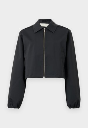 Black cropped jacket made of smooth fabric, featuring a collar, front zip closure, and elasticized cuffs. Simple design with no patterns.
