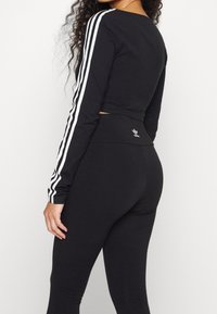 adidas Originals Tunn jacka - black