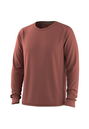 Pitkähihainen, pyöreäkauluksinen urheilupaita himmeän punaruskeasta, sileäpintaisesta kankaasta, jossa on kevyitä ryppyjä hihoissa valkoisella taustalla.