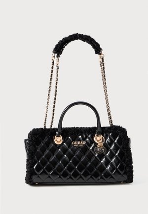 Black quilted faux leather handbag with fur accents, dual handles, and a chain strap. Features gold-tone hardware and brand logo.