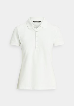 Hvit polotrøye i bomull med klassisk krage, korte ermer og fireknappers slag. Jevn tekstur og tettsittende design.