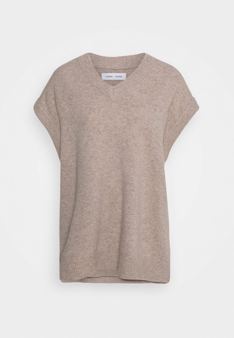 Gilet sans manches en maille beige avec col en V et bords roulés aux manches, présenté sur un fond blanc uni.