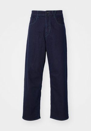 Dark blue denim pants with a straight leg cut, featuring a front button closure, belt loops, and contrasting stitching details.