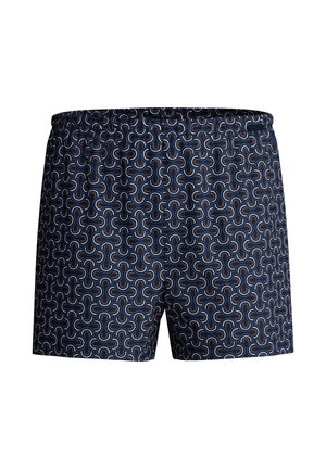 Marineblaue Badehosen mit einem sich wiederholenden, geschwungenen Muster in Hellblau und Braun. Elastischer Bund, leichtes Material und lockere Passform.