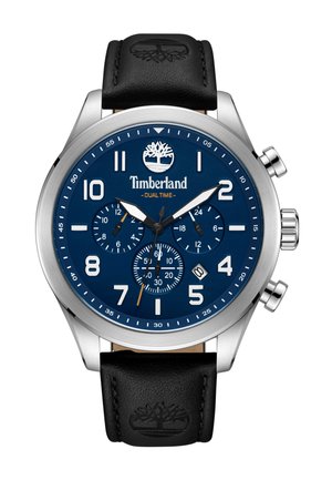 Montre chronographe Timberland avec boîtier en acier inoxydable, cadran bleu marine, bracelet en cuir noir, et marqueurs d'heure et sous-cadrans proéminents.
