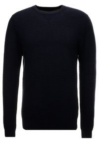 Mörkblå stickad tröja med ett strukturerat mönster, rund halsringning och långa ärmar. Avslutad med en ribbad nederkant och ärmslut.