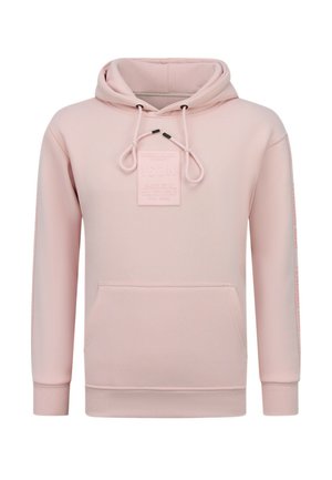 Lichtroze hoodie met voorzak, capuchon met trekkoord met zwarte uiteinden, en een vierkante patch met de tekst "ICON" en stadsnamen op de borst.