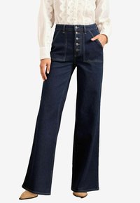 WIDE BUTTON FLY - Trapezaste traperice - indigo blue