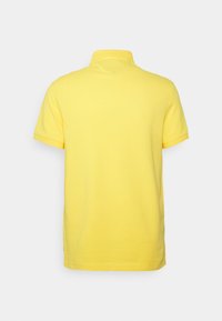 Tommy Hilfiger SLIM - Polo - warm yellow