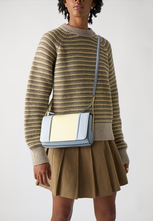 Crossbody bag in light blue and yellow leather, featuring a rectangular shape, minimal hardware, smooth texture, and an adjustable strap.