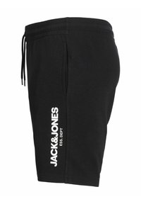Short noir à cordon avec poches latérales et texte blanc « JACK & JONES ESS. DEPT » imprimé verticalement sur la jambe gauche.