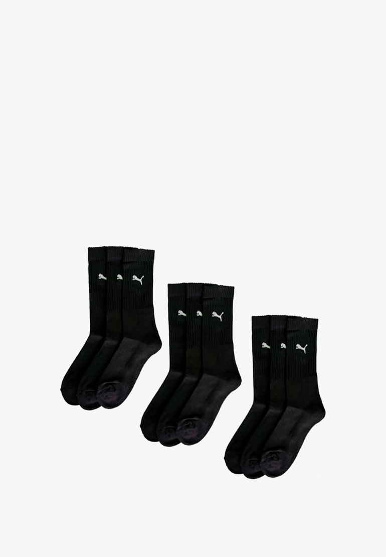 Schwarze Baumwollsocken mit gerippter Textur, versehen mit kleinen weißen Puma-Logos an der Oberseite. Set umfasst sechs Paare, alle in der gleichen Farbe.