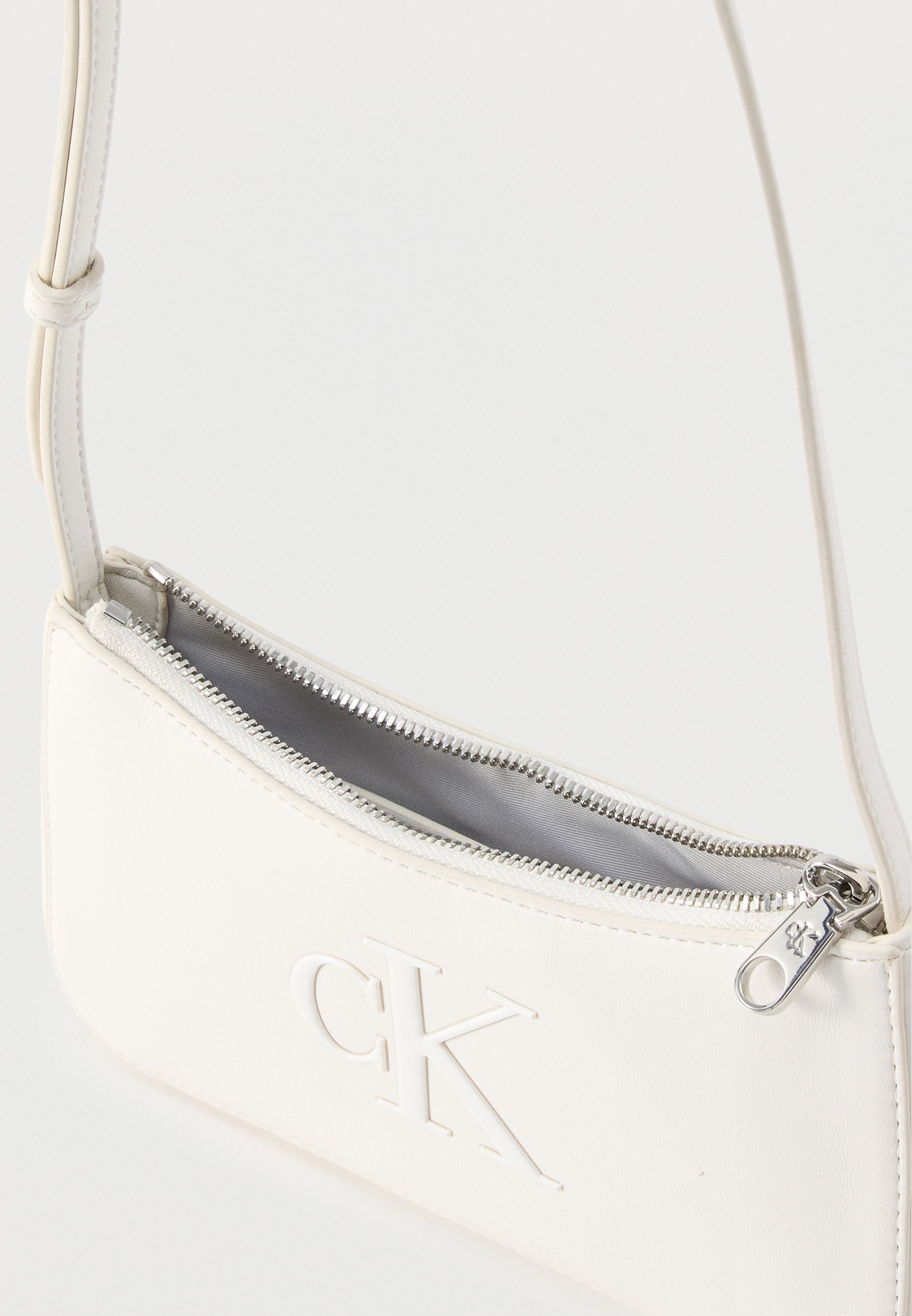 Calvin Klein BOLD MINI BAG - Cross body bag - off-white - Zalando.ie