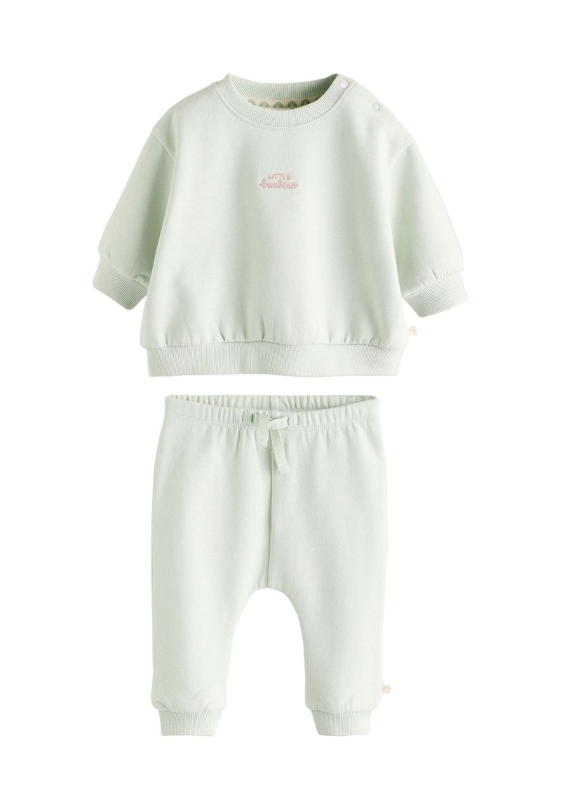 Ensemble assorti vert clair pour enfants, comprenant un sweat-shirt à manches courtes avec texte brodé et un pantalon à taille élastique avec cordon de serrage.