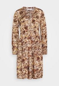 Kukkakuosiset pitkähihaiset mekko, jossa on beige, ruskea ja keltainen kuvio. Valmistettu kevyestä kankaasta, jossa on kerrostettu hamedesign.