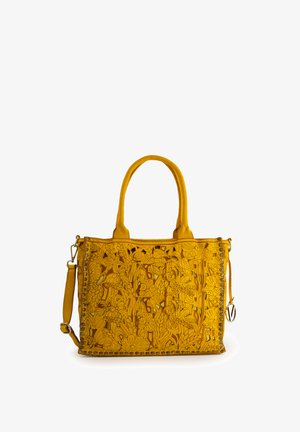 Gelbe Lederhandtasche mit floralem Ausschnittdesign, doppelten oberen Griffen, abnehmbarem Schultergurt und dekorativen Nietendetails.