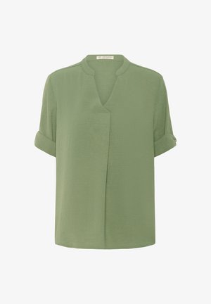 Light green short-sleeve blouse with rolled cuffs, a V-notch collar, and a subtle overlapping front panel.