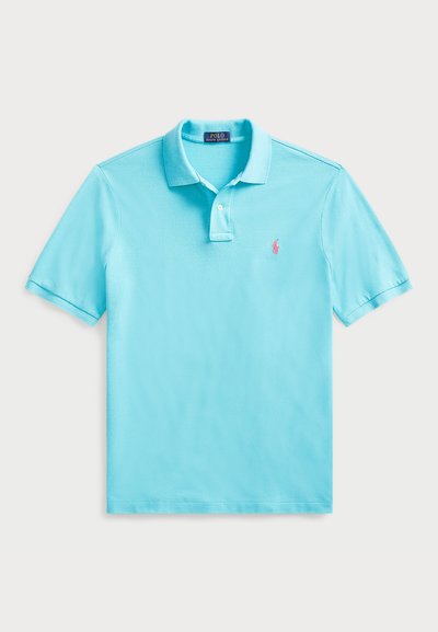 Heledsinine polo särk, puuvillane materjal, lühikesed varrukad, kahe nööbiga krae, vasakul rinnal väike roosa logo.