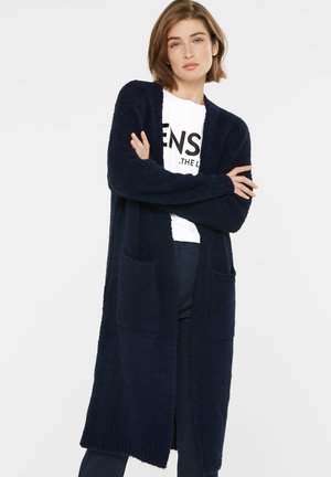 Navy langer Cardigan aus plüschigem Stoff mit strukturierten Oberflächen, offener Front, langen Ärmeln und zwei Fronttaschen.