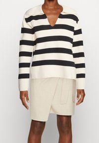 ARKET Stickad tröja - black