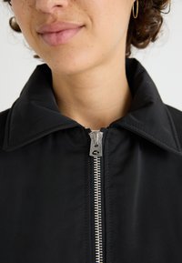 Weekday PADDED JACKET - Bomber Jacket - black