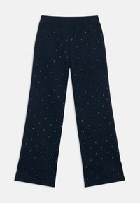 Navy blue pants with a wide-leg design, made of soft fabric, featuring all-over small silver dot embellishments and an elastic waistband.