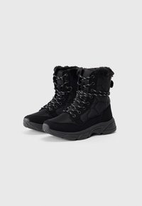 Pair of black mid-calf winter boots with padded quilted texture, reflective laces, thick rubber soles, and fleece lining on top edges.