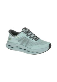 Light blue athletic shoe with a mesh upper, grey accents, and a cushioned sole featuring oval cutouts for ventilation and flexibility.