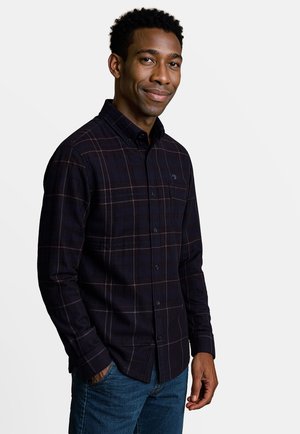 Heren donker geruit shirt met knopen, lange mouwen en een knoopsluiting aan de kraag, gemaakt van zachte stof met een subtiele textuur.