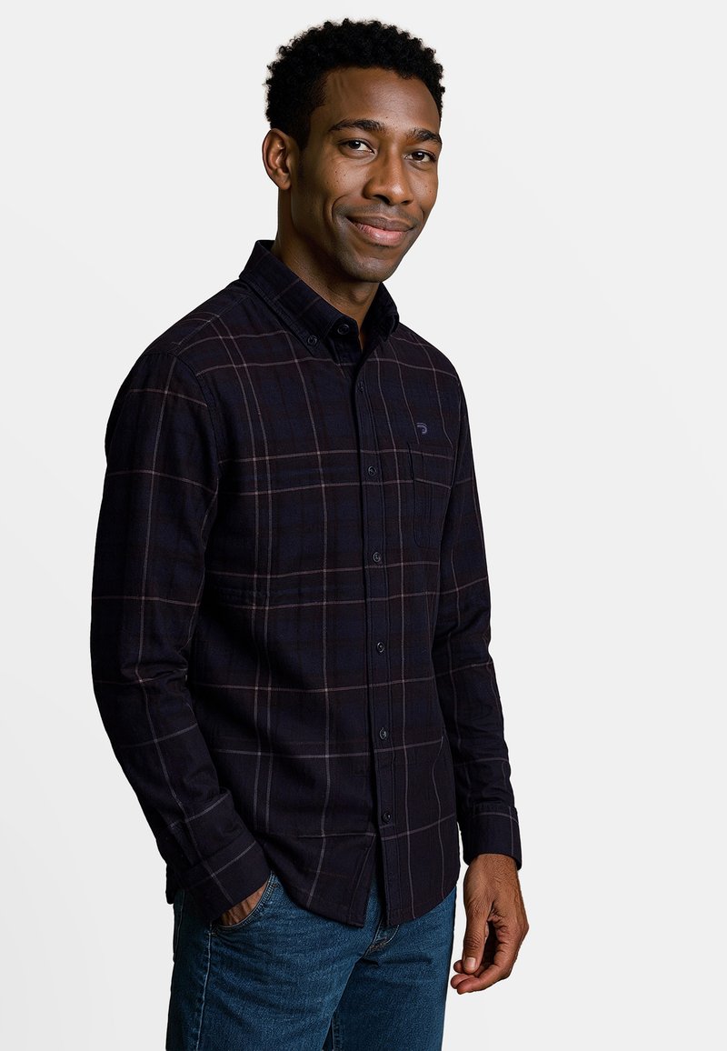 Heren donker geruit shirt met knopen, lange mouwen en een knoopsluiting aan de kraag, gemaakt van zachte stof met een subtiele textuur.