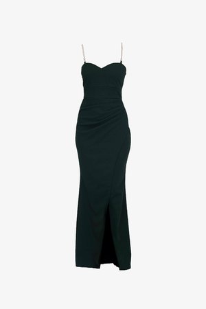 Black sleeveless dress with a fitted bodice, draped detailing, a thigh-high slit, and chain-accented straps. Soft, smooth fabric.