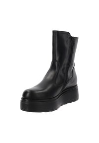 Zwarte leren enkelboot met een zijrits, ronde neus en een dikke, gestructureerde plateauzool voor extra hoogte en stabiliteit.